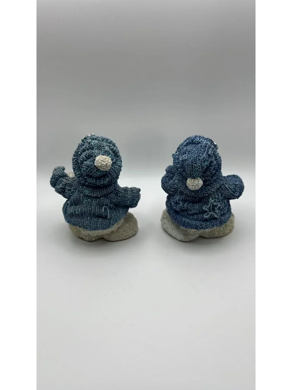 Set Of 2 Glittered Blue Snowman Figurines With Knitted Look Holding Birdhouse &